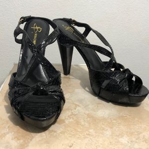 Black snakeskin textures heels